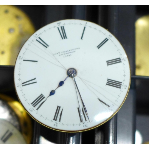 679 - A collection of pocket watch dials and movements