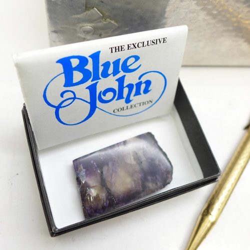 697 - A piece of unmounted Blue John, a stone set scent bottle, a necklace, a bottle and a box