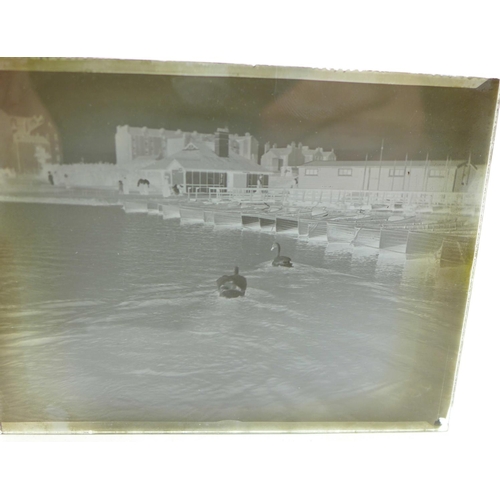 705 - Two boxes of glass plate negatives, circa 1905-1910, including views of Oldham, Morecambe, Cheshire,... 