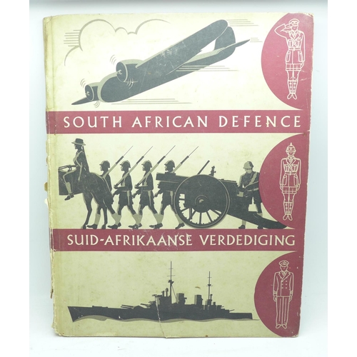 720 - A South African Defence book with Collectors cards