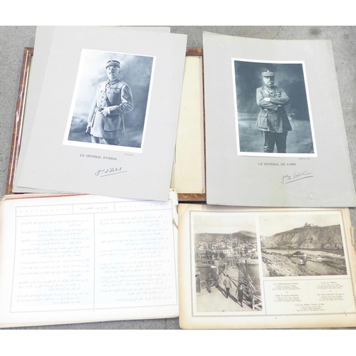 722 - Eleven photographs of French Generals and troops and two books on East African troops