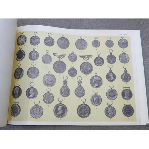 723 - One volume, German Orders and Medals, by Troft, published by Wilhelm Braumuller, with slip case (in ... 