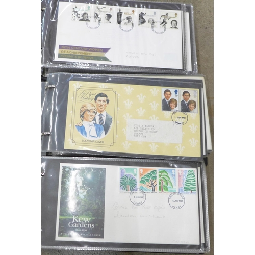 753 - An album of 58 GB first day covers, 1977 to 1989, various years, an album of 64 first day covers 198... 