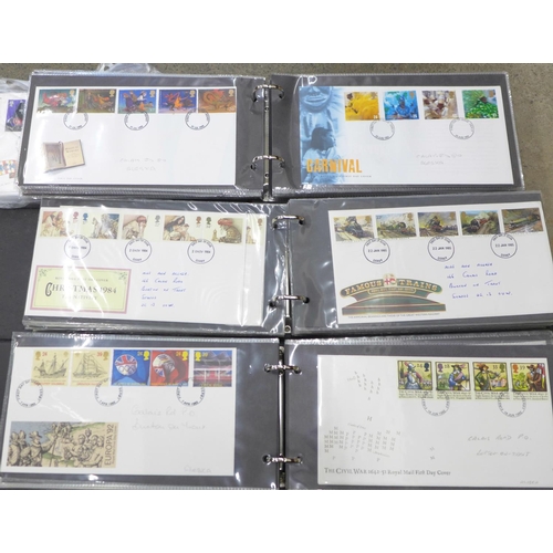 753 - An album of 58 GB first day covers, 1977 to 1989, various years, an album of 64 first day covers 198... 