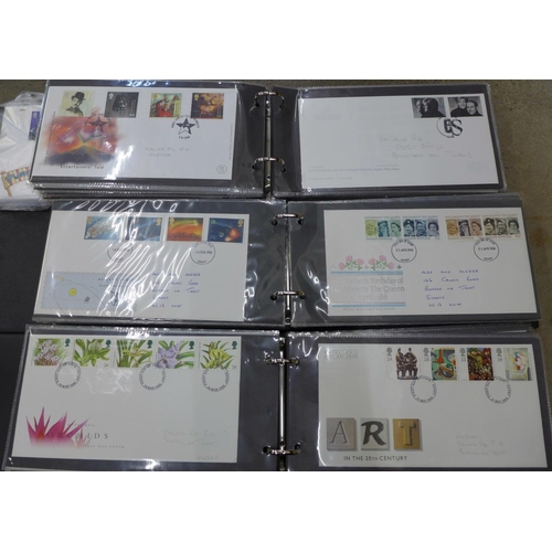 753 - An album of 58 GB first day covers, 1977 to 1989, various years, an album of 64 first day covers 198... 