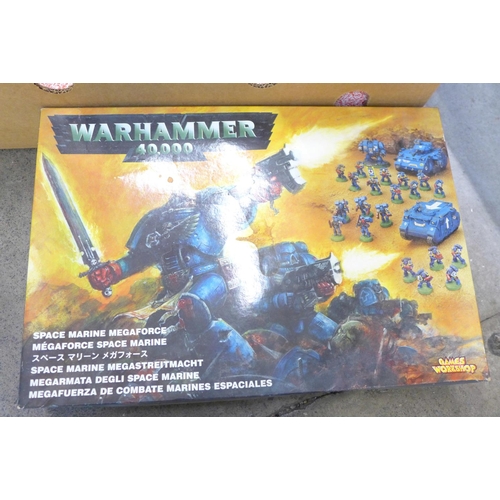 768 - A collection of Games Workshop Warhammer figures and vehicles