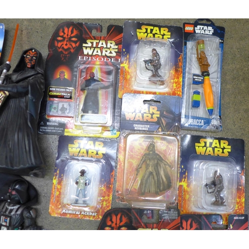 771 - A collection of Star Wars die-cast figures in blister packs from Episode One and other figures