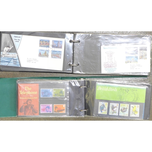 778 - An album of 83 Queen Elizabeth II first day covers, colonial and others and an album of 74 + 4 loose... 