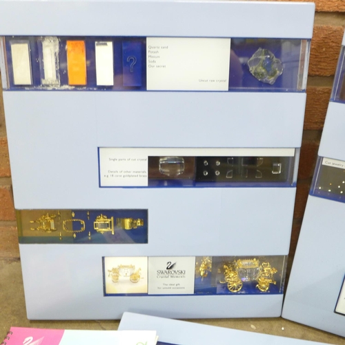 787 - A Swarovski sample case with a Coronation type coach, spray brooches and part brooches, a beetle and... 