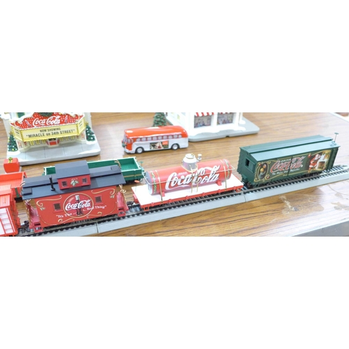 794 - A Hawthorne Village Bachmann Coca-Cola train set, with locomotive, carriages, buildings and track, w... 