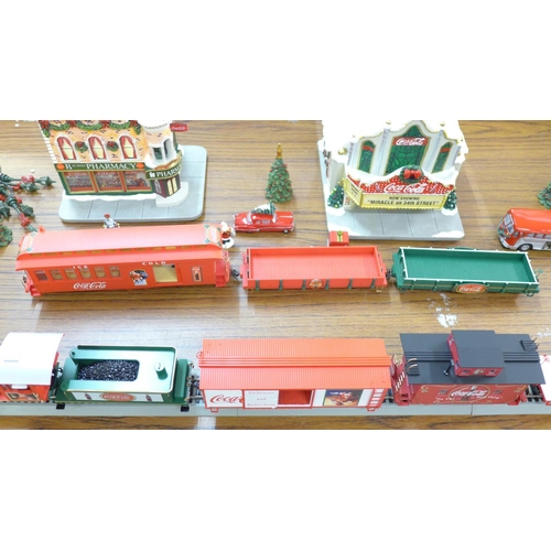 794 - A Hawthorne Village Bachmann Coca-Cola train set, with locomotive, carriages, buildings and track, w... 