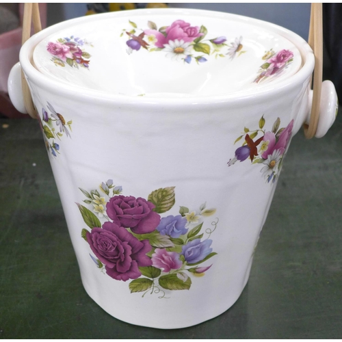 797 - An ironstone cream floral decorated slop bucket with lid and cane handle