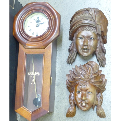 808 - A box of African and other tourist carvings and a wooden wall clock