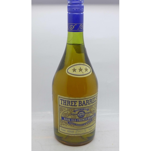 811 - A bottle of Three Barrels Rare Old French Brandy, 35.2 fl.oz. or 1litre