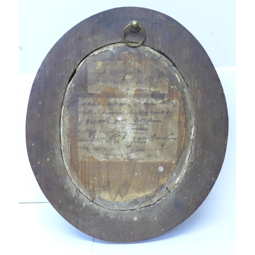 816 - A signed early 19th Century relief plaque dated 1831 in a wooden acorn decorated frame