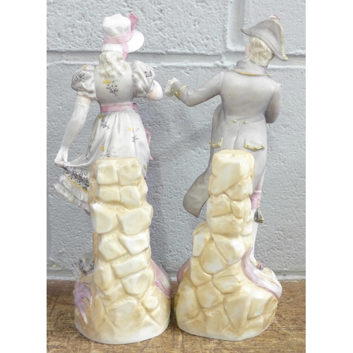 831 - A pair of German porcelain figures by Rudolstadt Ernst, Bohne Sohne, 26.5cm, a/f