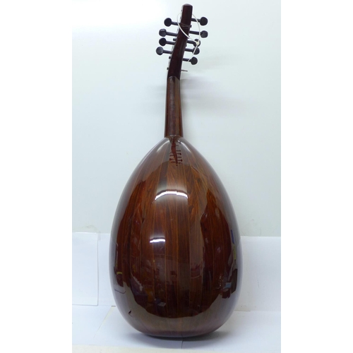 842 - An oud with soft case, a/f (case back and tensioner)