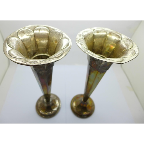 849 - A pair of silver vases, Sheffield 1914, James Deakin & Sons, 24.5cm, weighted bases, some a/f