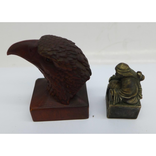 874 - A modern eagle netsuke, signed, a novelty bronze seal and a shingle back lizard fob, (3)