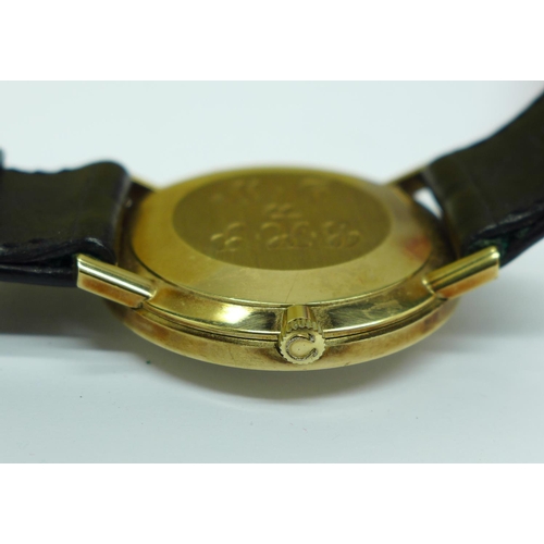 890 - A 9ct gold Omega manual wind wristwatch, case back engraved, with 9ct gold buckle, boxed