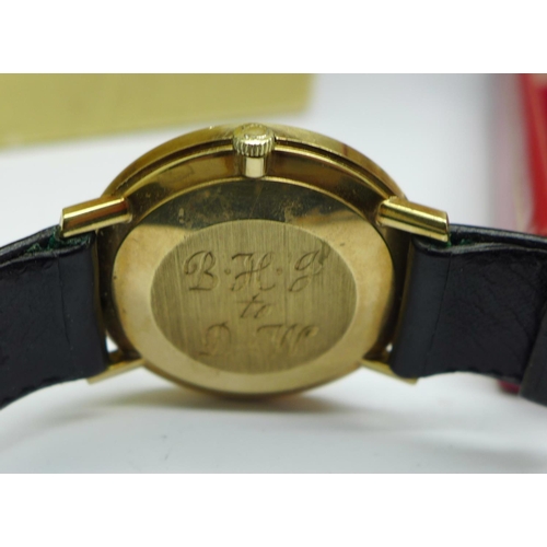 890 - A 9ct gold Omega manual wind wristwatch, case back engraved, with 9ct gold buckle, boxed