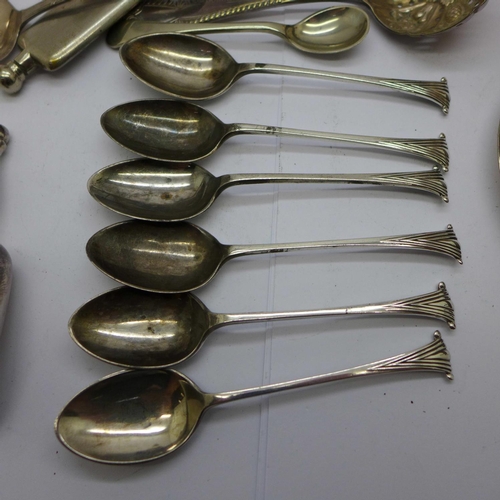 908 - Six silver teaspoons, 74g, a Moorcroft lustre egg cup and plated items