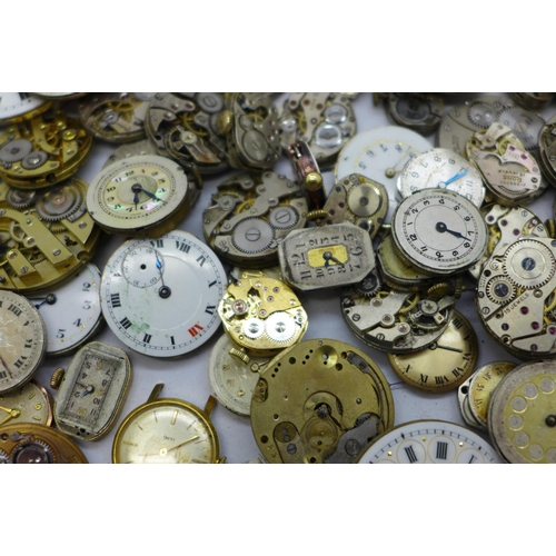 919 - Approximately  100 wristwatch and pocket watch movements, including Tissot, etc.