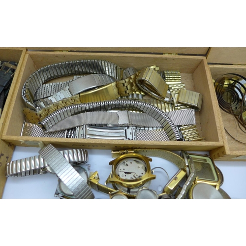 950 - Assorted wristwatch crowns, watches and parts, a/f