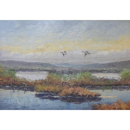 10 - V.A. Larsen, estuary landscape with mallards in flight, oil on canvas, 44 x 64cms, framed