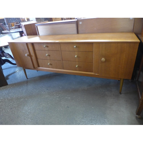 116 - A teak sideboard