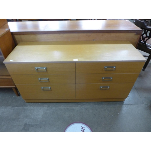 125 - A teak chest of drawers