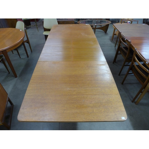 133 - A McIntosh teak double extending dining table