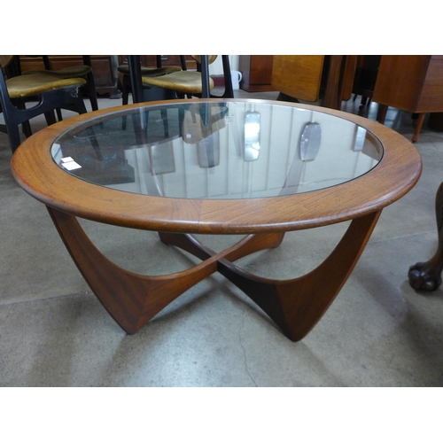 135 - A G-Plan Astro teak and glass topped circular coffee table