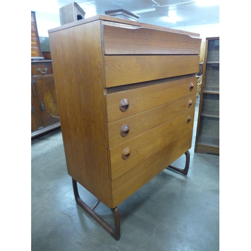 140 - A teak chest of drawers