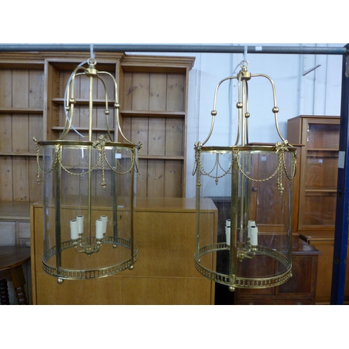 195 - A pair of French style gilt metal cylindrical hanging ceiling lanterns