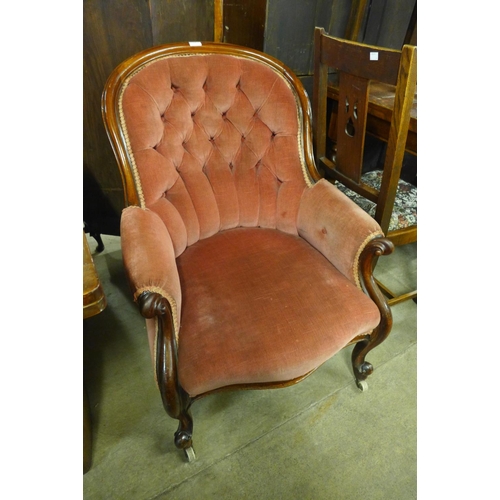 264 - A Victorian mahogany and upholstered armchair