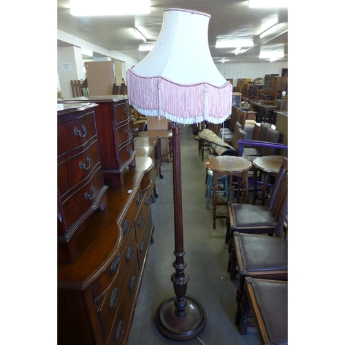 286 - A mahogany standard lamp