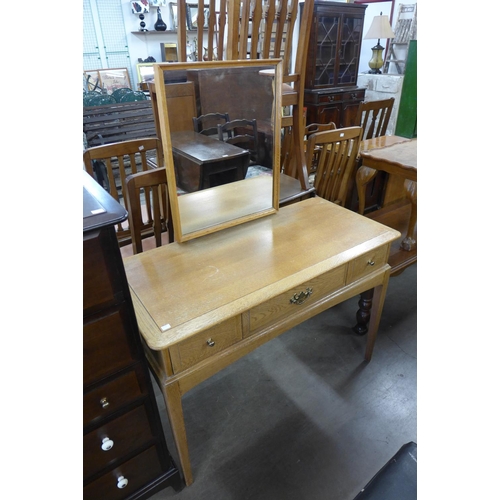 295 - Two Stag Minstrel chests of drawers and a Stag oak dressing table