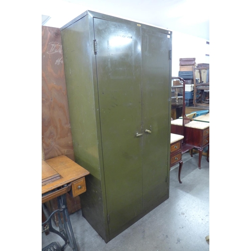 300 - A steel two door cabinet