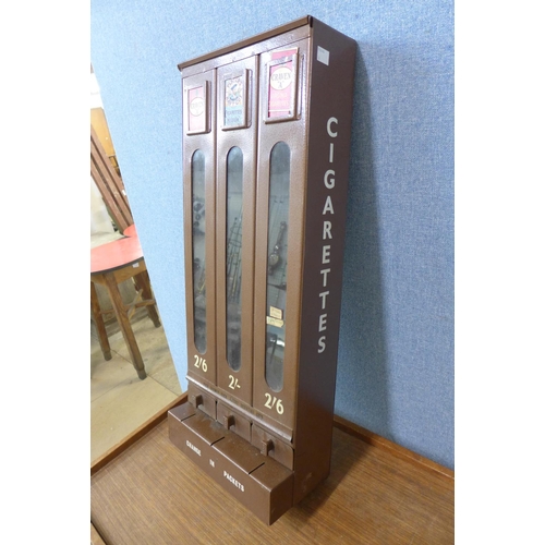 403 - A vintage steel cigarette vending machine