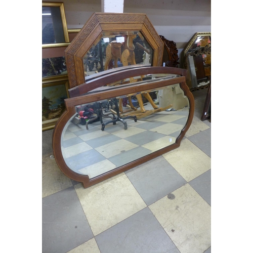 414 - A carved oak octagonal mirror and two others