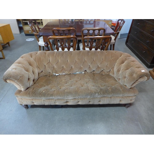 97 - A Victorian mahogany and upholstered Chesterfield settee