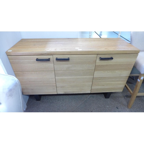 1600 - A Fusion oak large three door sideboard