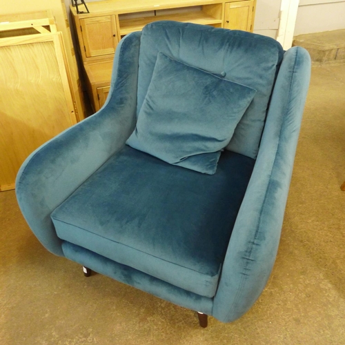 1687 - A teal velvet armchair