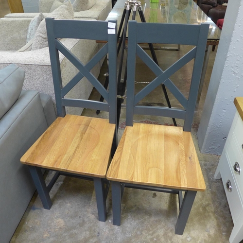 1702 - A pair of slate blue dining chairs (ref 76) *this lot is subject to VAT