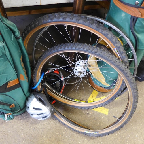 2573 - Bike wheel, 2 tyres, 2 helmets and bike lock with key