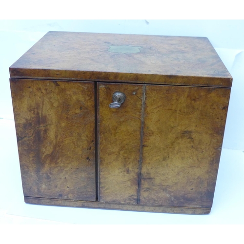 675 - A late 19th Century burr walnut campaign cigar box with original Bramah lock and key and brass reces... 