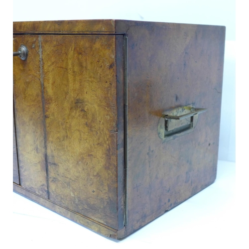 675 - A late 19th Century burr walnut campaign cigar box with original Bramah lock and key and brass reces... 