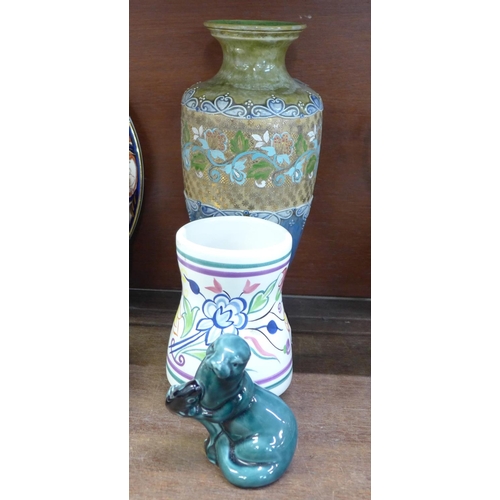 686 - A Royal Doulton vase, a Poole vase and Poole seal