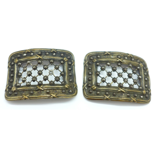 687 - A pair of Georgian steel cut gentleman's shoe buckles